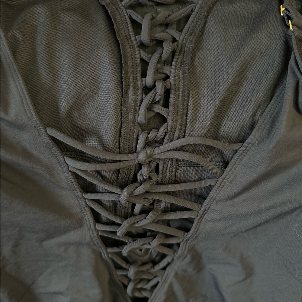 Black bathing suit . NEVER WORN . Brand new